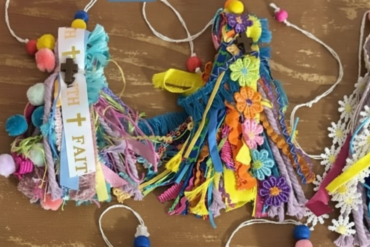 Colorful tassel decorations on a wooden surface with numbers indicating steps.