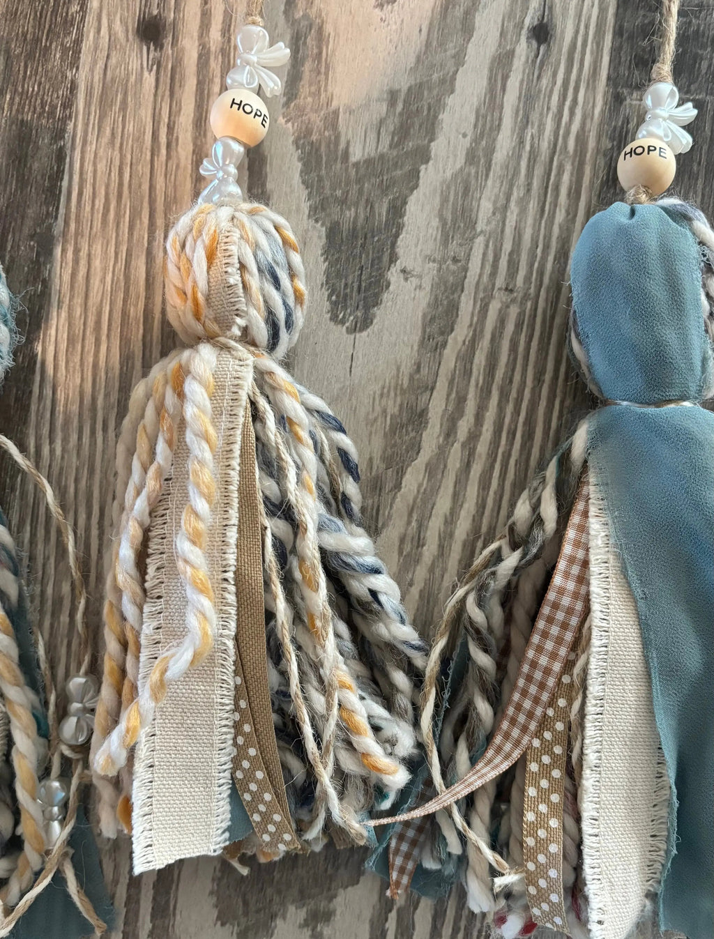 blue, brown, beige ribbon and yarn tassel bookmark