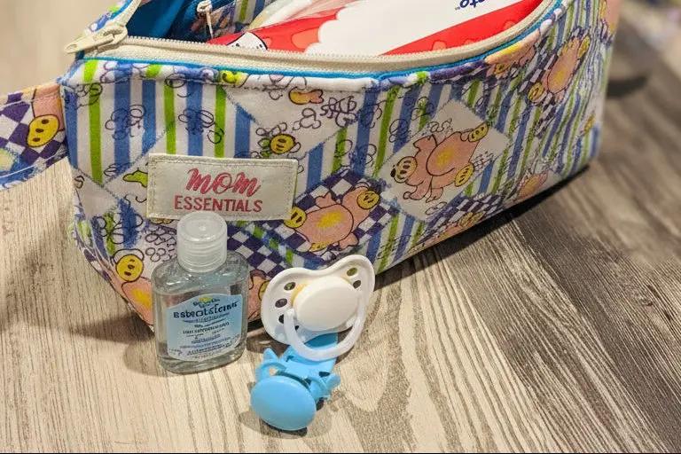 open view of handmade clutch for diaper and wipes on the go for mom of young children