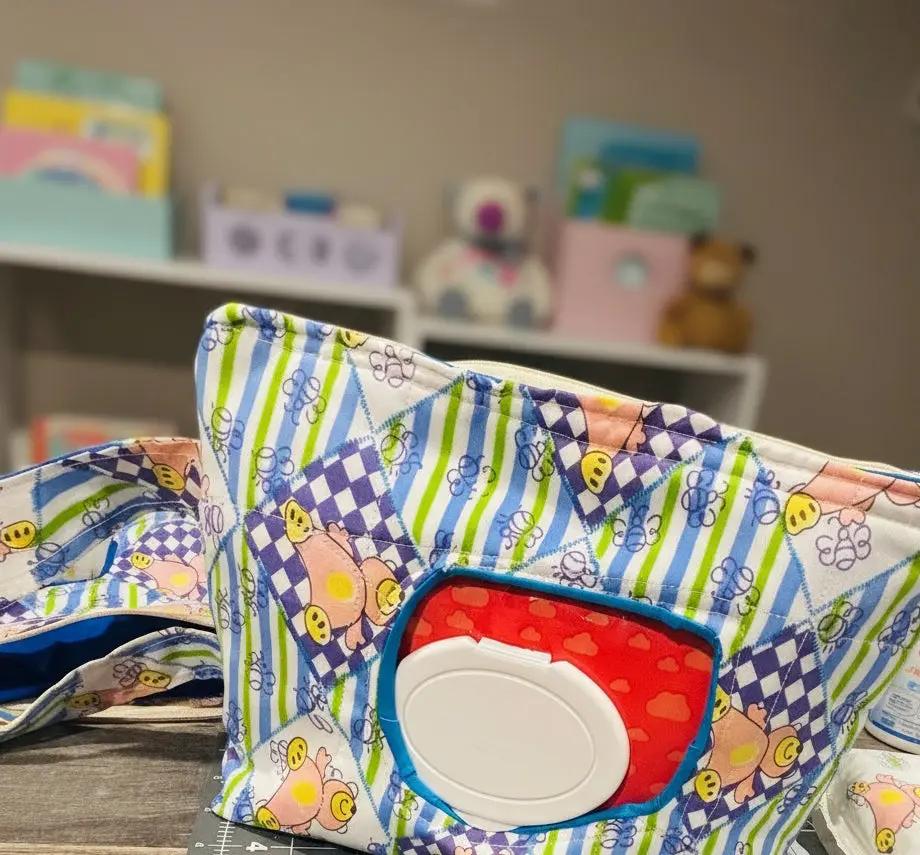 colorful Teddy bear theme diaper and wipe clutch for moms on the go, easy access to wipes and diapers without the whole diaper bag