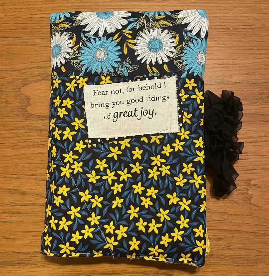 sunflower pattern, blue flowers, bible verse and black lace strap on quilted handmade bible cover